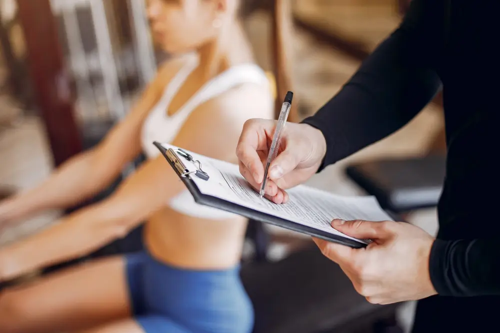 WeStrive coach writing client workout notes