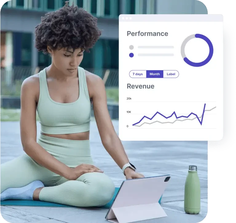Fitness coach using Glofox app performance dashboard to track revenue and client growth