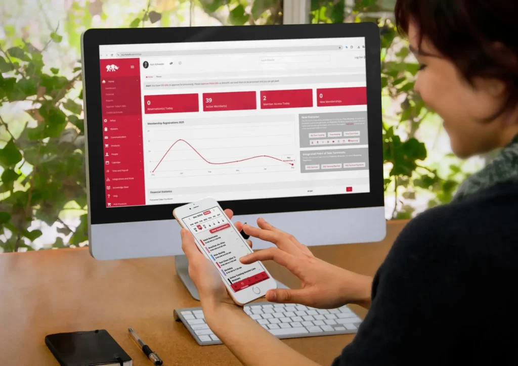 RhinoFit interface showing membership analytics and access control features on multiple devices