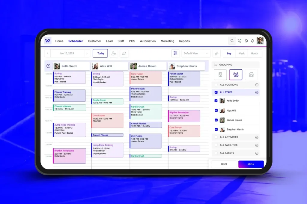 Wellyx gym scheduler feature displaying staff schedules, classes, and fitness training sessions in a modern gym environment